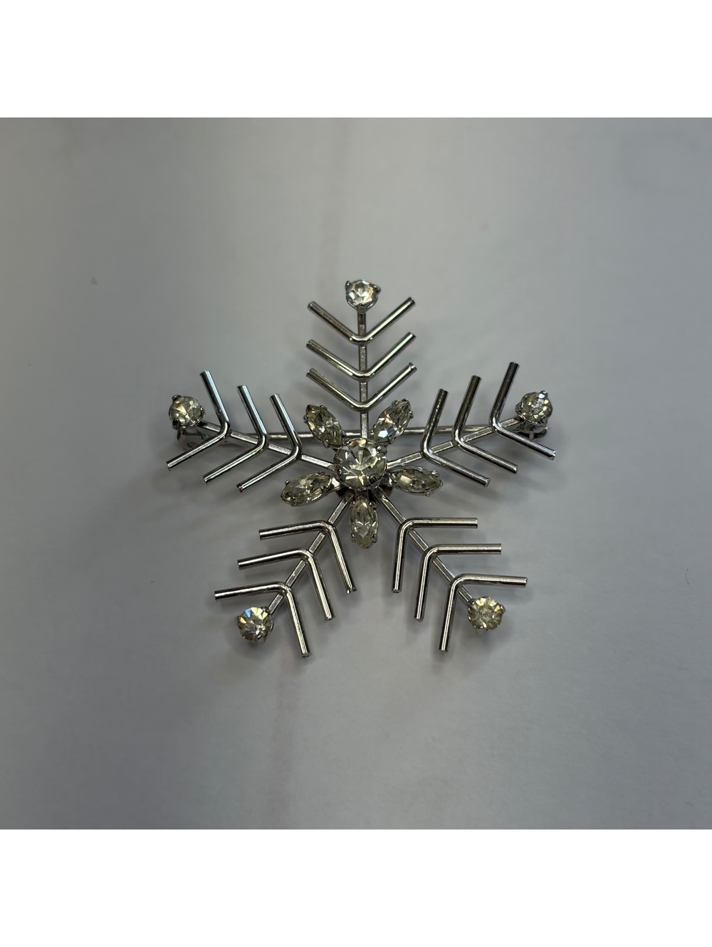 Krementz rhinestone rolled gold plated snowflake brooch